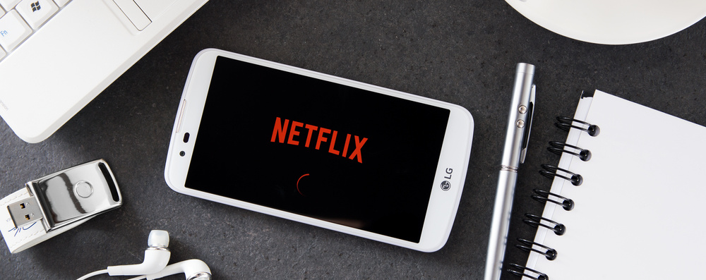 Photo of mobile phone with Netflix logo