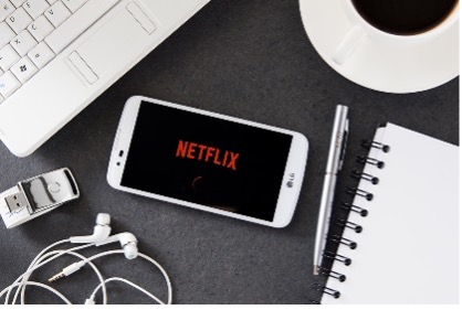 Photo of mobile phone with Netflix logo