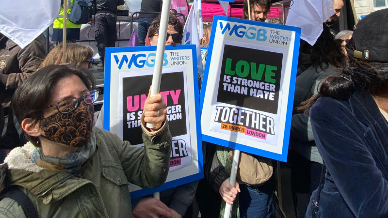 WGGB members with placards and flags on the Together Alliance march against the far-right