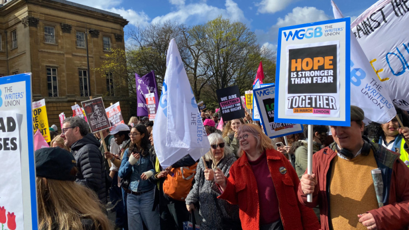 WGGB members with placards and flags on the Together Alliance march against the far-right