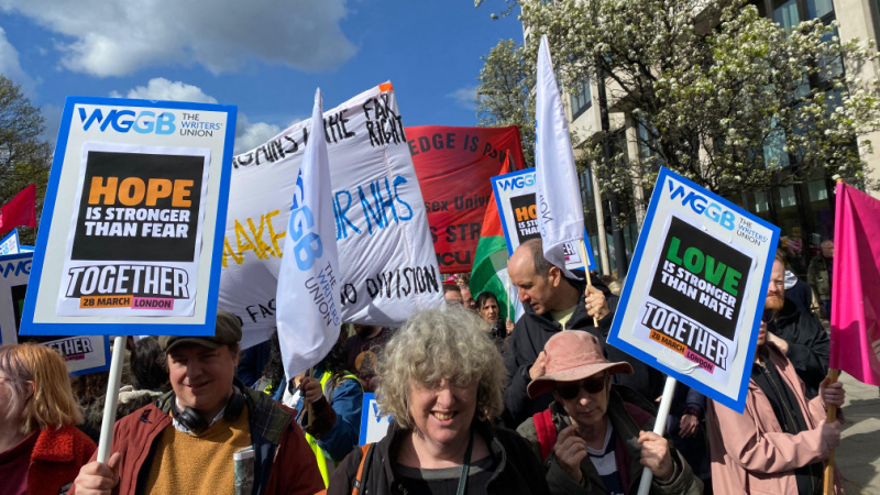 WGGB members with placards and flags on the Together Alliance march against the far-right