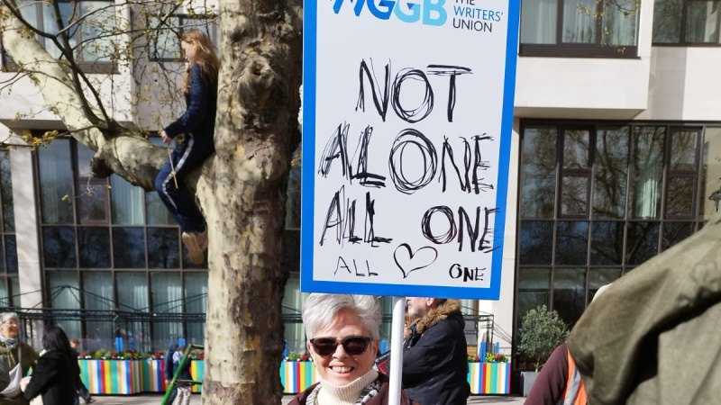 WGGB members with placards and flags on the Together Alliance march against the far-right